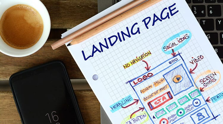 A grid sketch pad showing a page titled 'Landing Page' and a drawn wireframe of a website page