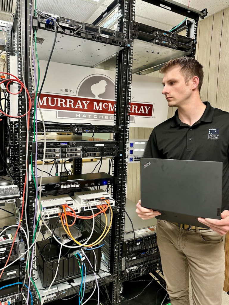 Saltech employee working at the Mrray McMurray Hatchery