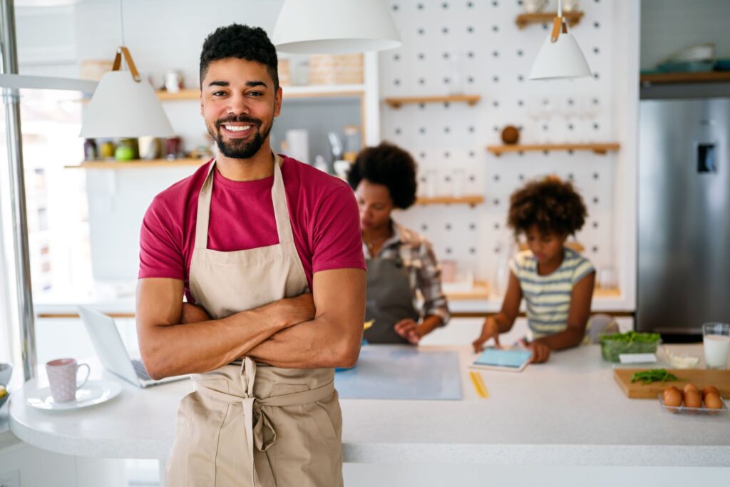 Small business owner standing in his shop