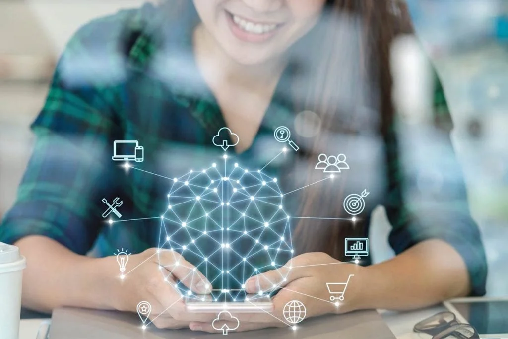 A woman on a phone, with an overlayed graphic showing icons for cloud hosting, maintenance, shopping cart, etc.